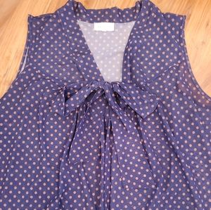 Sleeveless polka dot blouse